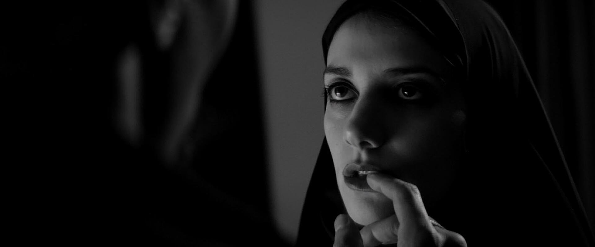 A girl walks home alone at night